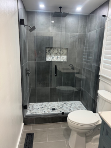 After bathroom renovation Canton GA - modern bathroom with new fixtures and bright lighting